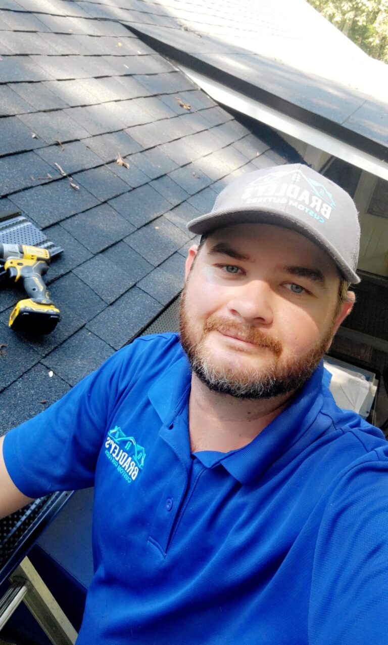 man with a cap on the roof